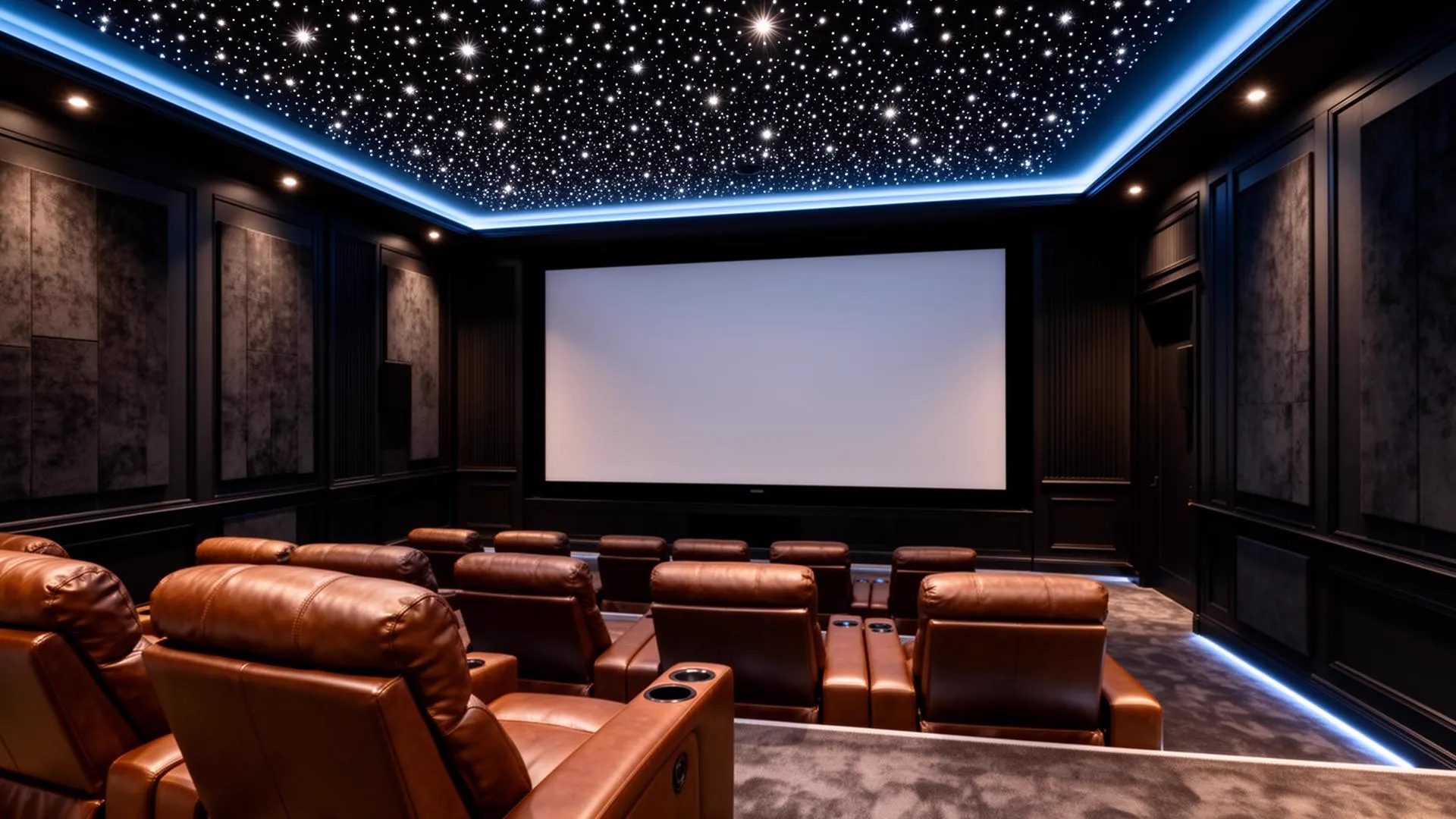Architecturally integrated private cinema with concealed speakers and tiered seating